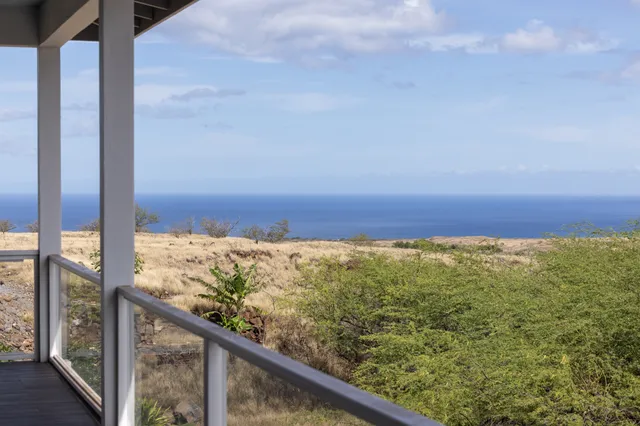 a view of a large window with an outdoor space