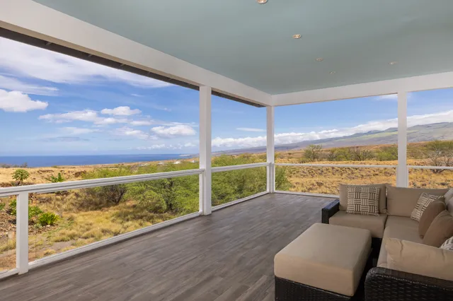 a view of swimming pool with furniture