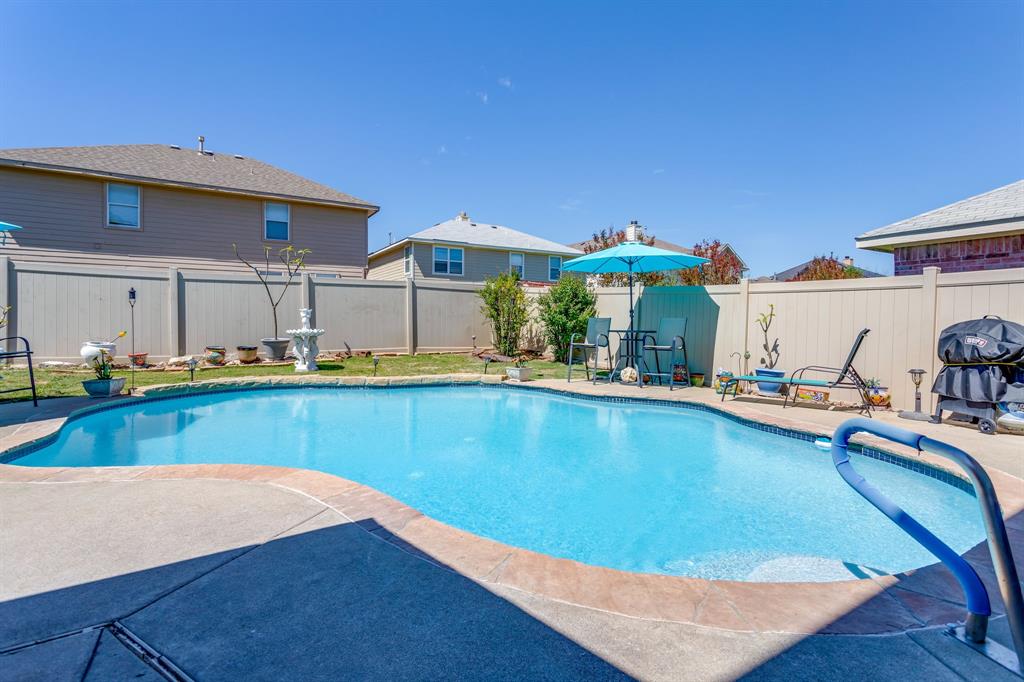 4816 Sleepy Ridge Circle Fort Worth, TX 76133 - Photo 27 of 36 View of swimming pool featuring a fenced backyard and patio surround