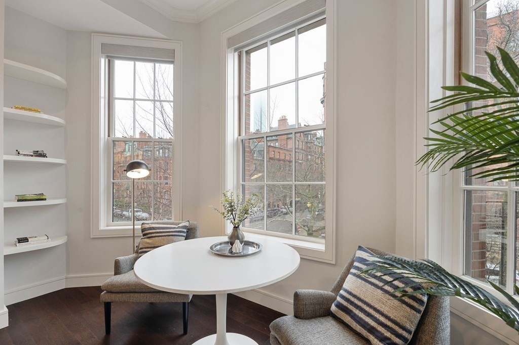 11 Exeter Street, Unit 5 Boston, MA 02116 - Photo 4 of 13 a view of a dining room with furniture and window