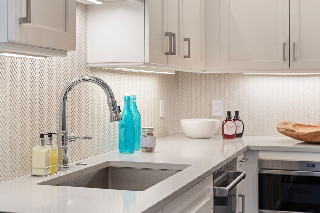 11 Exeter Street, Unit 5 Boston, MA 02116 - Photo 6 of 13 a kitchen with a sink and cabinets