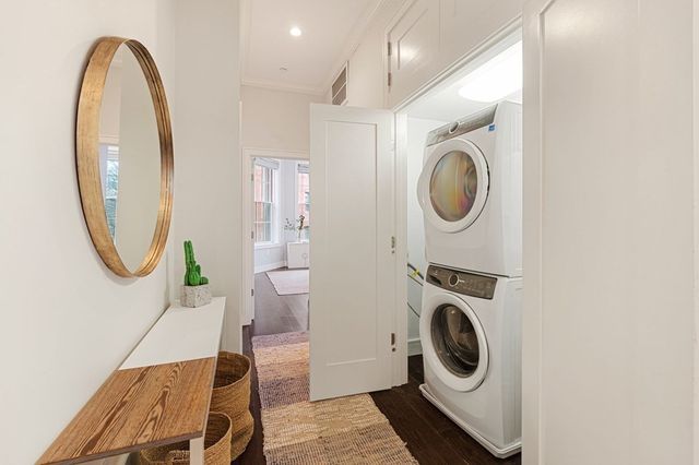 a utility room with dryer and washer