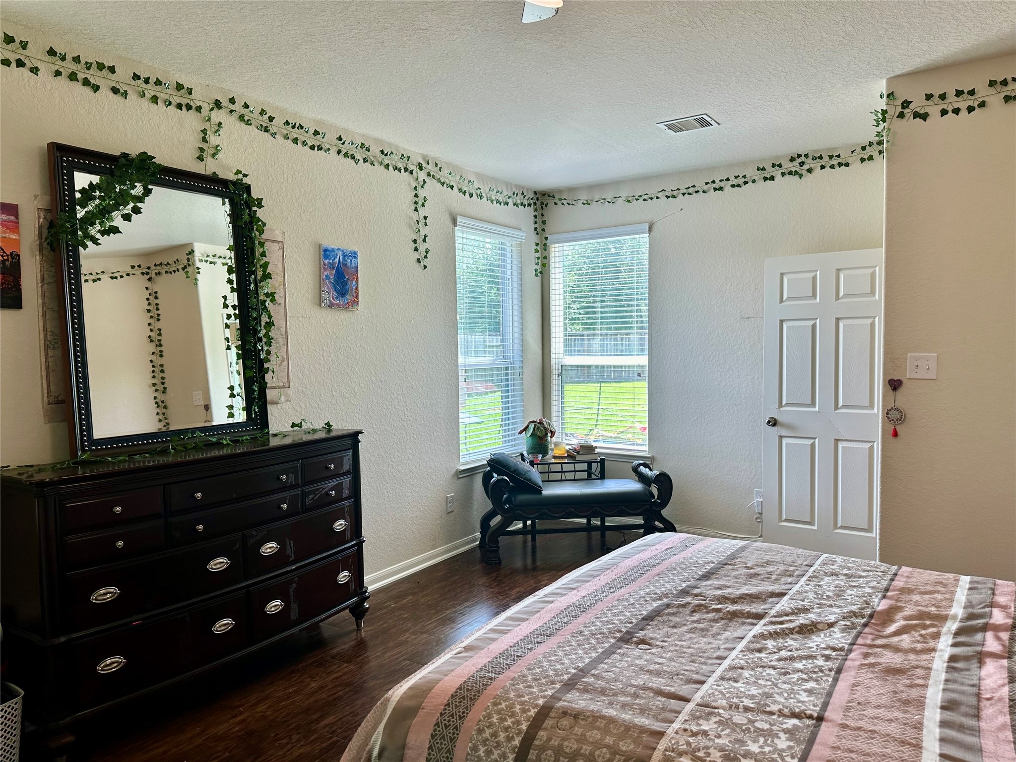 18622 Each Elm Way Houston, TX 77084 - Photo 11 of 35 a bedroom with a bed and a window