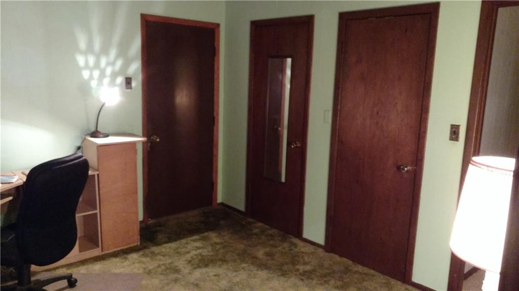 125 Birch Road Acme, PA 15610 - Photo 14 of 18 Bedroom features two closets and a bath, plus access to garage