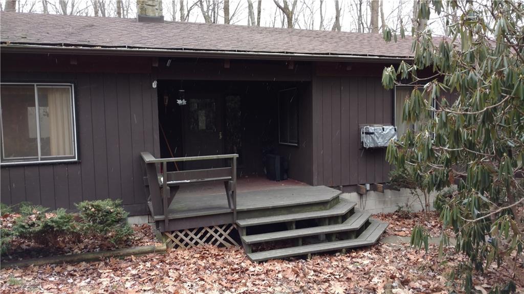 125 Birch Road Acme, PA 15610 - Photo 3 of 18 The front porch features a built-in bench seat
