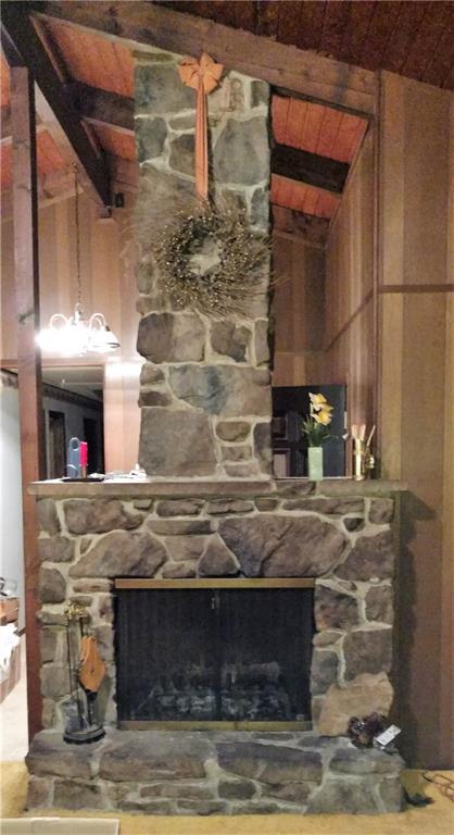 125 Birch Road Acme, PA 15610 - Photo 8 of 18 Beautiful stone fireplace to keep you cozy