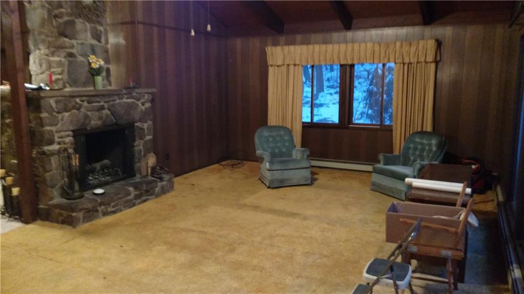 125 Birch Road Acme, PA 15610 - Photo 10 of 18 Living room with fireplace