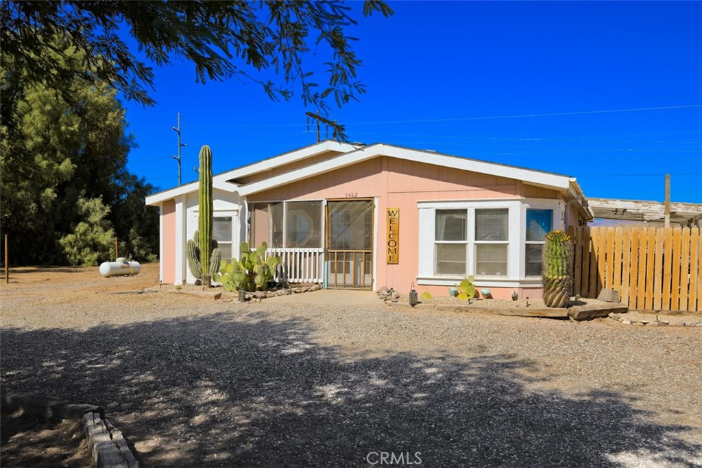 5482 Dapishu Road Big River, CA 92242 - Photo 1 of 1 a front view of a house with a yard
