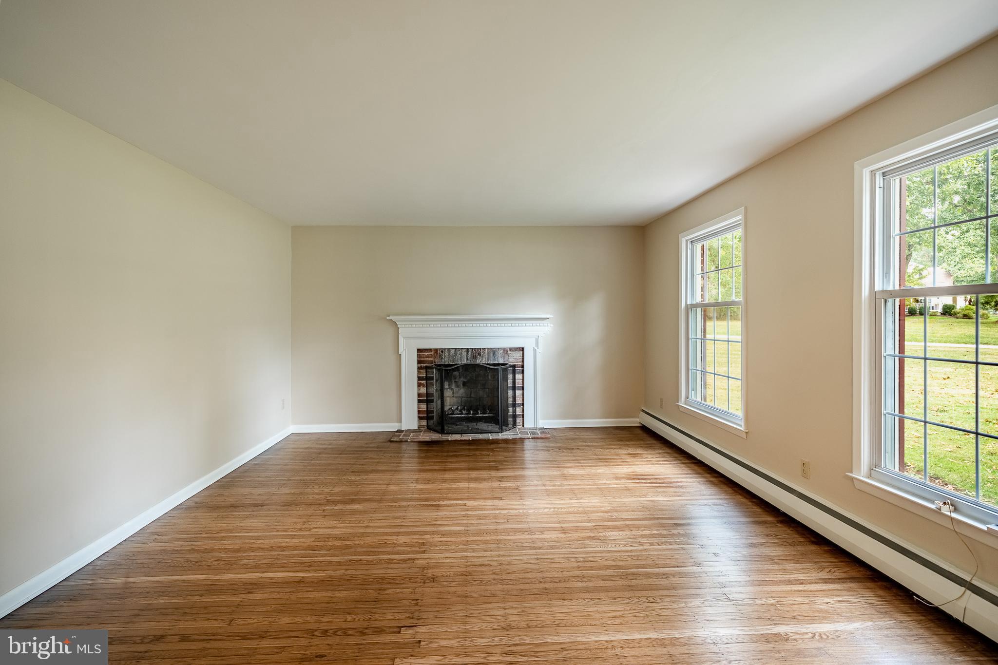 8 Andrews Road Malvern, PA 19355 - Photo 13 of 62 a view of an empty room with window and fire place