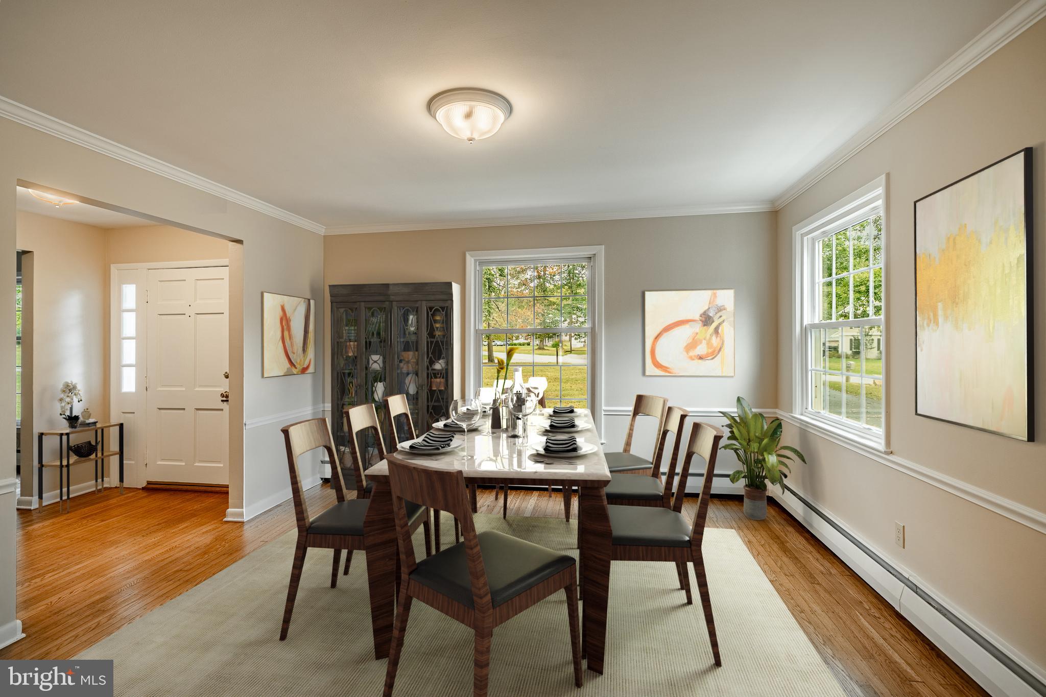 8 Andrews Road Malvern, PA 19355 - Photo 14 of 62 a view of a dining room with furniture window and wooden floor