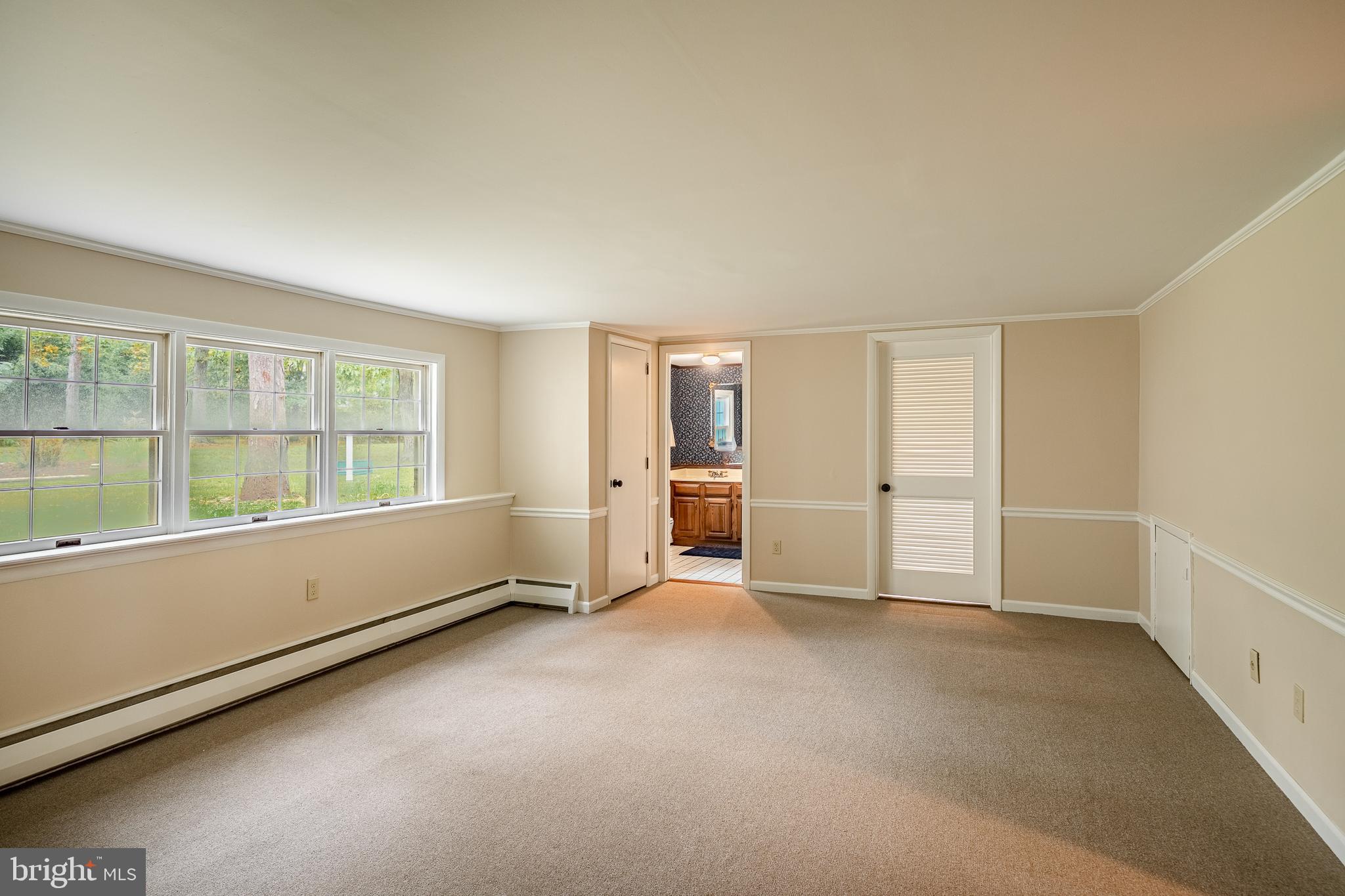 8 Andrews Road Malvern, PA 19355 - Photo 31 of 62 an empty room with a empty space and windows