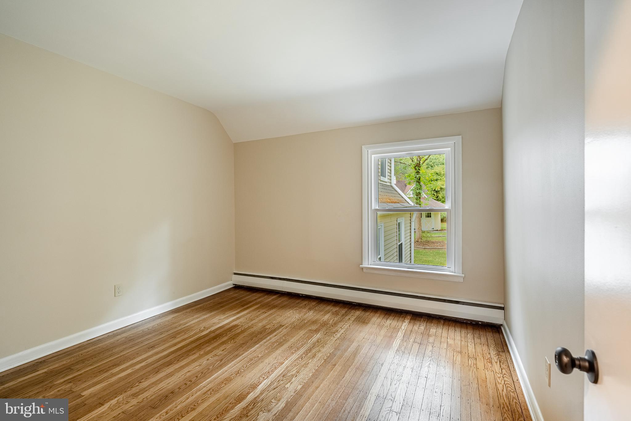 8 Andrews Road Malvern, PA 19355 - Photo 33 of 62 an empty room with wooden floor and windows