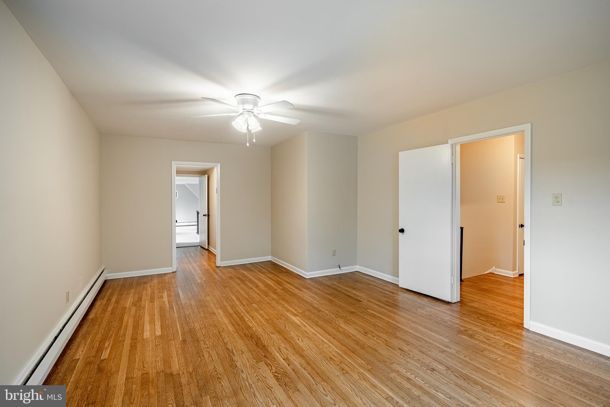 8 Andrews Road Malvern, PA 19355 - Photo 39 of 62 a view of empty room with wooden floor