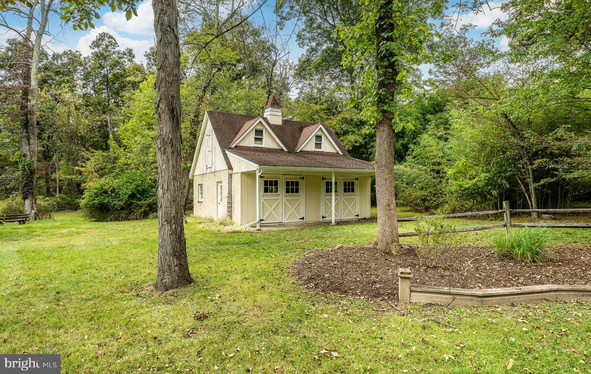 8 Andrews Road Malvern, PA 19355 - Photo 52 of 62 a front view of a house with garden