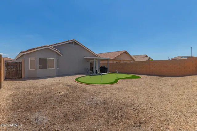 a view of a house with swimming pool
