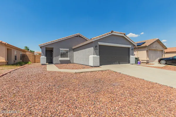 a picture of a bench in front of a wall