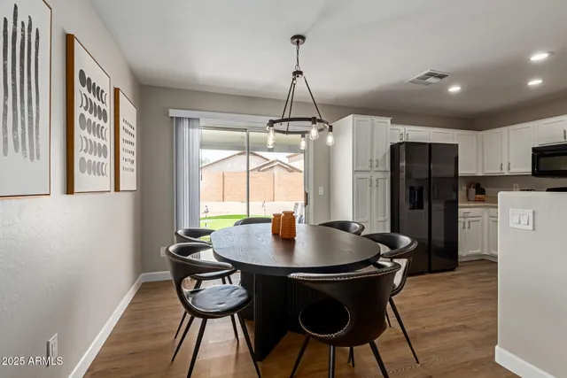 a living room with furniture a rug and a window