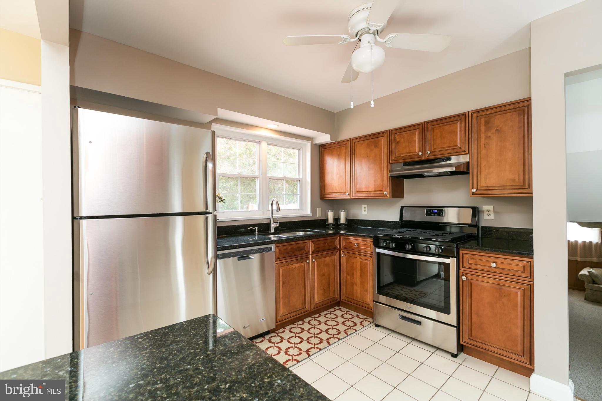 214 Quaker Ridge Road Lutherville-Timonium, MD 21093 - Photo 7 of 29 Kitchen-designer cherry cabinets,SS appliances,