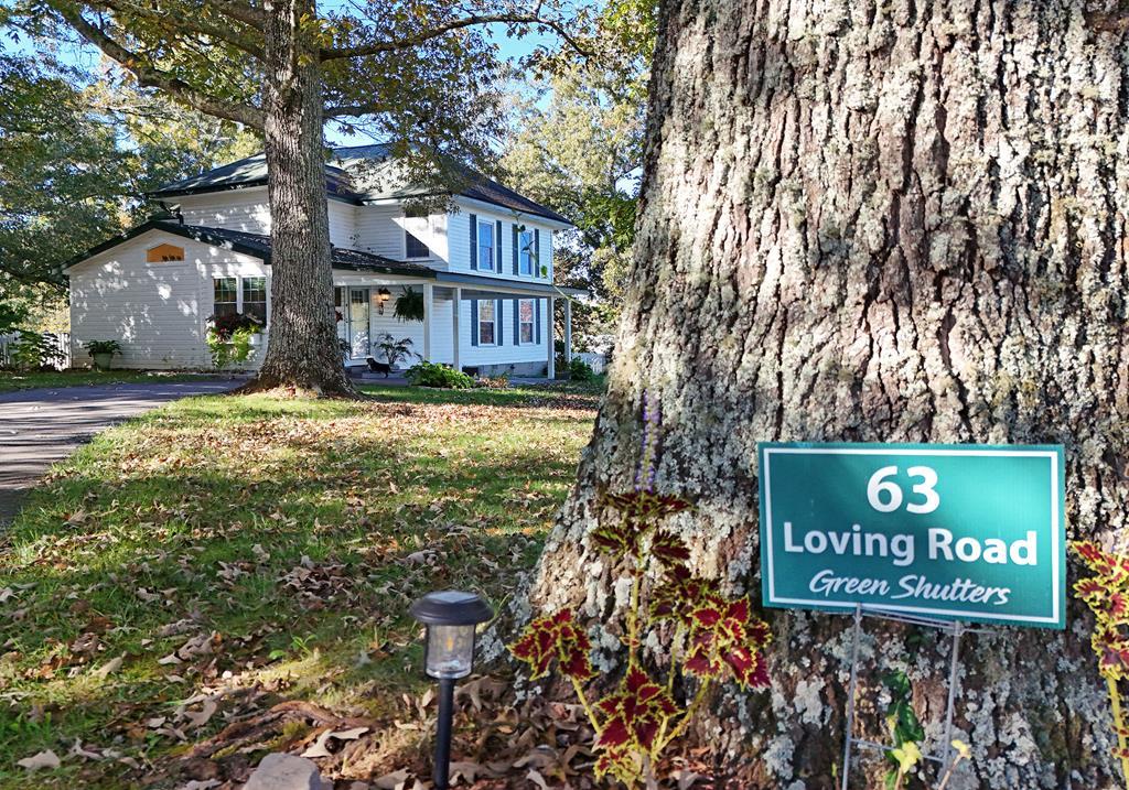 63 Loving Road Morganton, GA 30560 - Photo 5 of 58 a sign on the side of a building