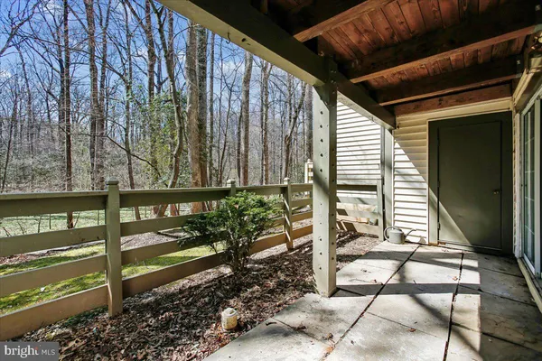 a view of backyard with porch