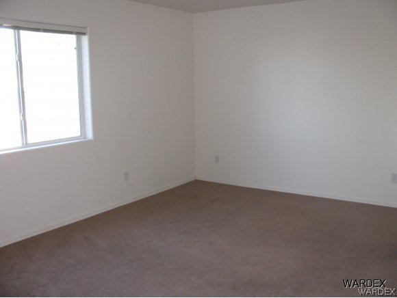 2176 Jamie Road Fort Mohave, AZ 86426 - Photo 7 of 8 an empty room with a window