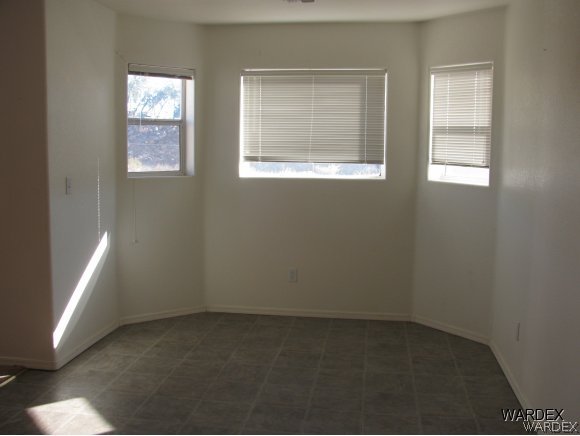2176 Jamie Road Fort Mohave, AZ 86426 - Photo 8 of 8 an empty room with a window