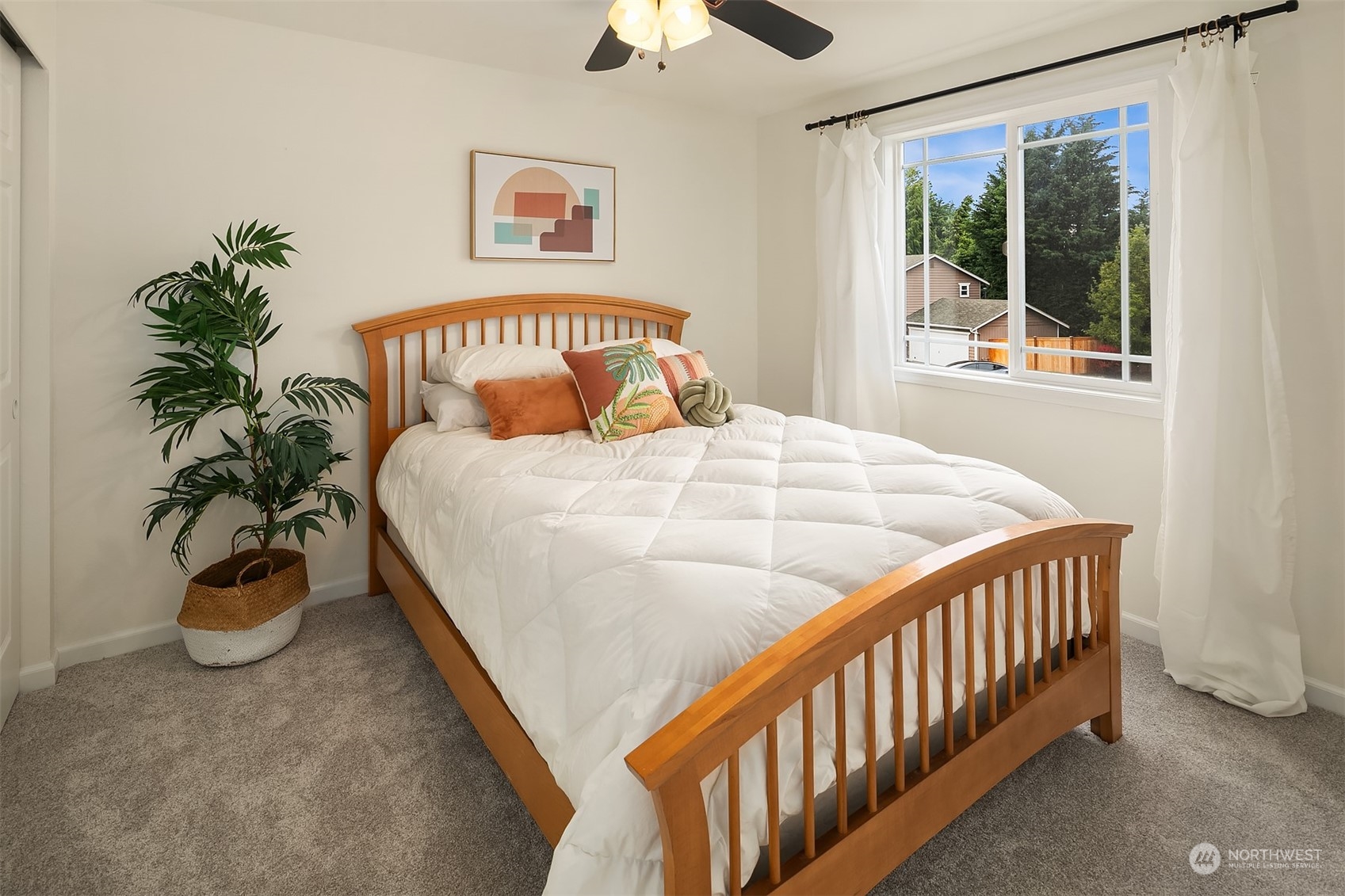 3410 189th Street Southeast Bothell, WA 98012 - Photo 15 of 23 a bedroom with a bed and a window
