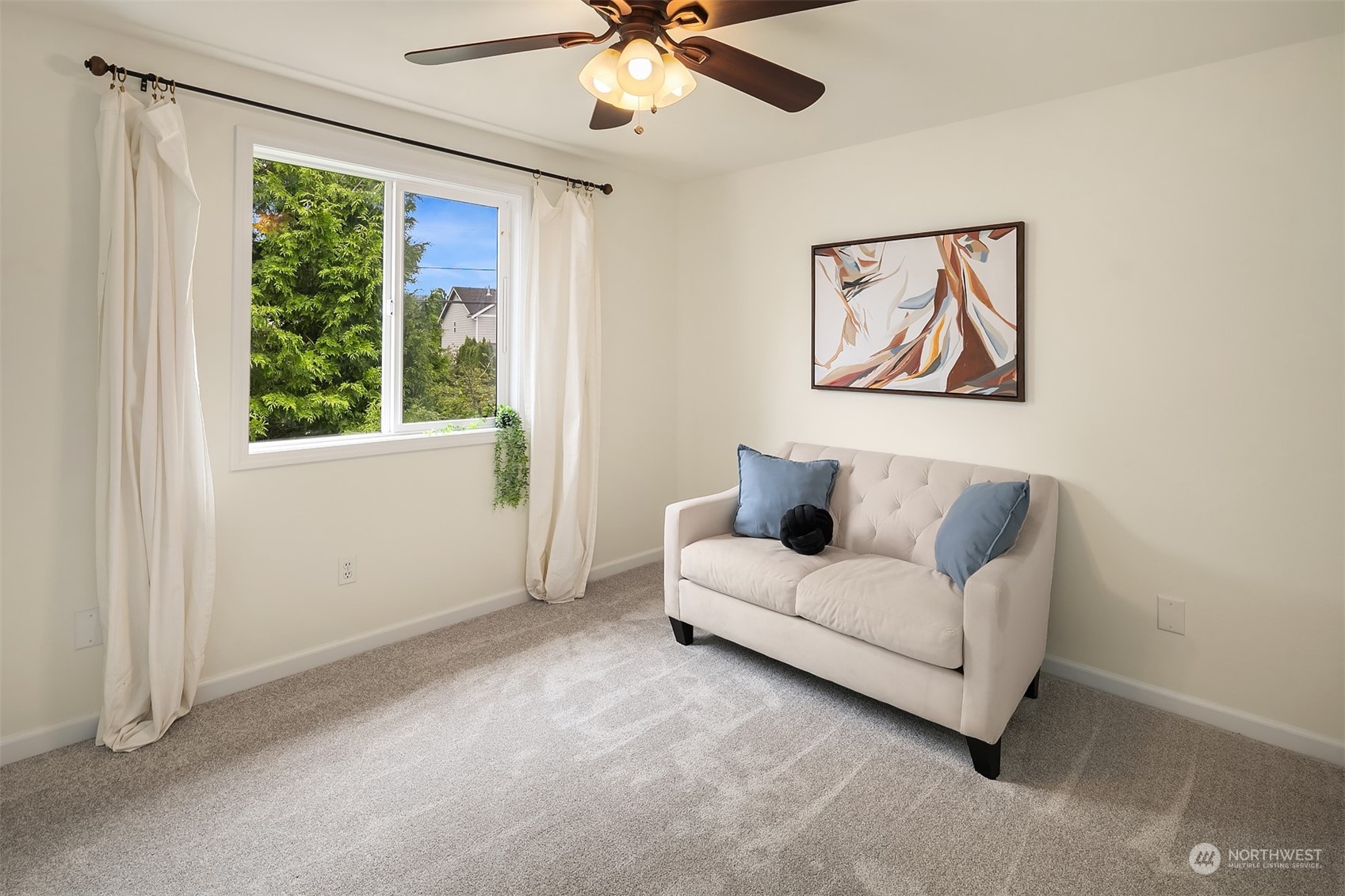 3410 189th Street Southeast Bothell, WA 98012 - Photo 16 of 23 a living room with furniture and a window