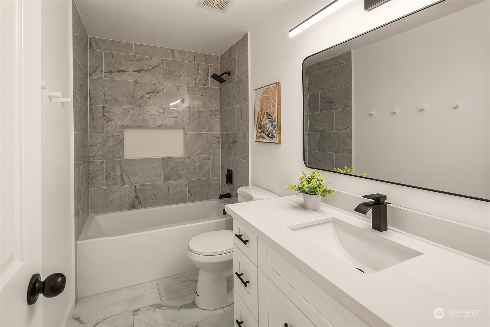 3410 189th Street Southeast Bothell, WA 98012 - Photo 17 of 23 a bathroom with a sink toilet and shower