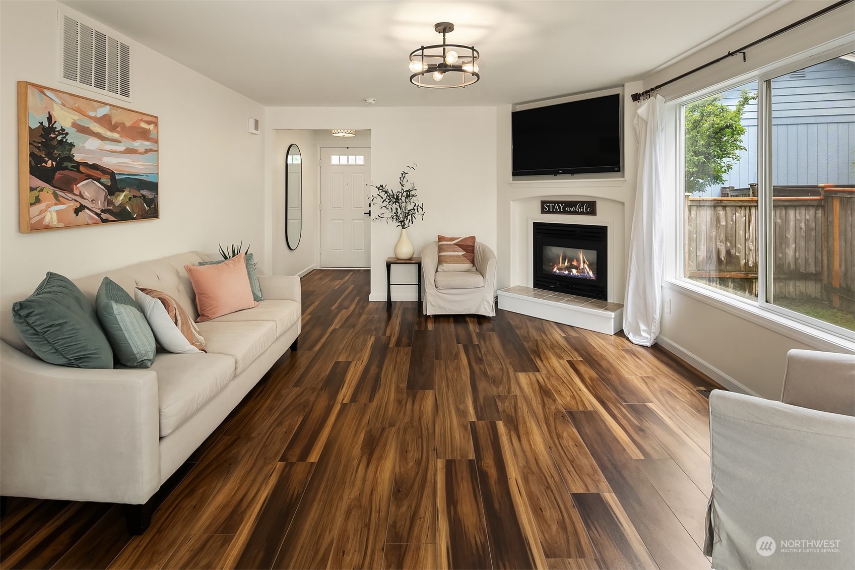 3410 189th Street Southeast Bothell, WA 98012 - Photo 5 of 23 a living room with furniture fireplace and flat screen tv