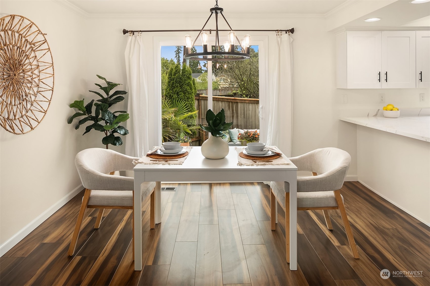 3410 189th Street Southeast Bothell, WA 98012 - Photo 7 of 23 a dining room with furniture and wooden floor