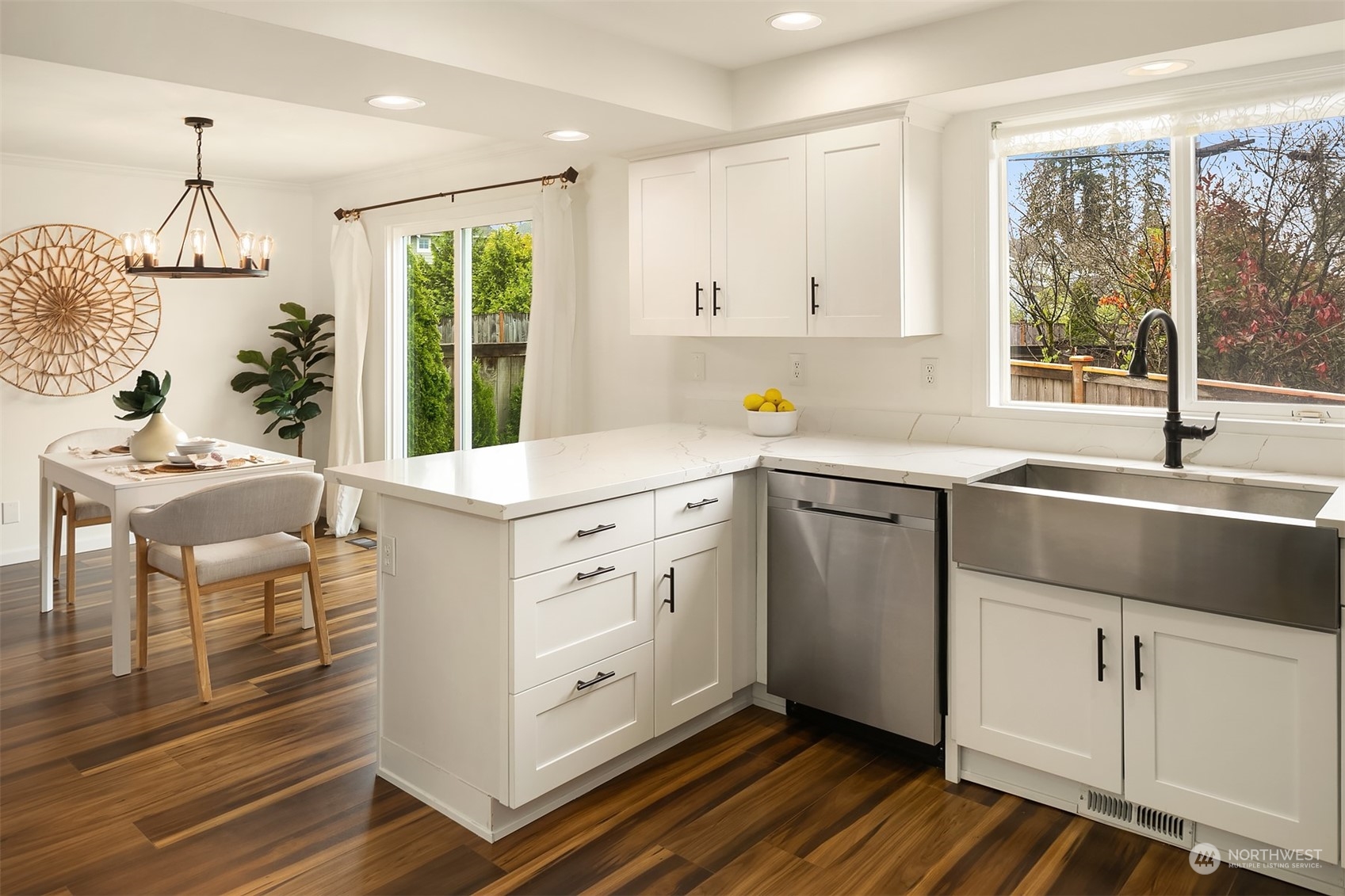 3410 189th Street Southeast Bothell, WA 98012 - Photo 10 of 23 a kitchen that has a sink and a stove in it