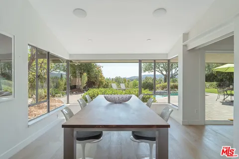 a bathroom with a tub and shower
