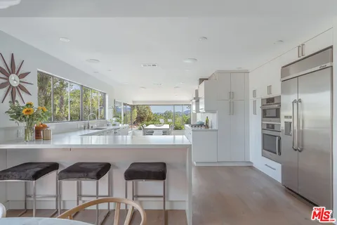 a view of a swimming pool and a yard