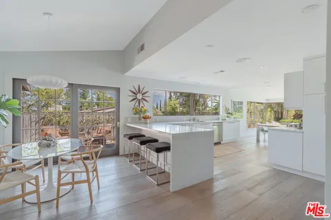 a view of swimming pool with a patio and a yard