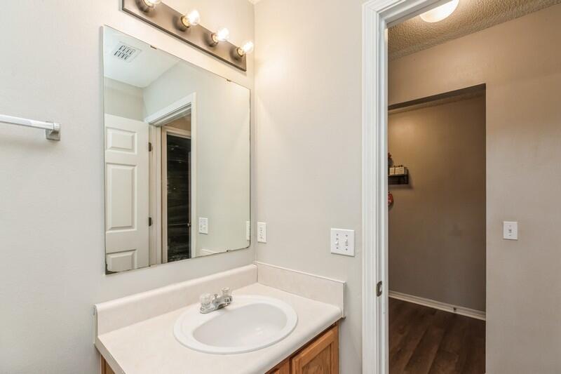 264 Limestone Circle Crestview, FL 32539 - Photo 29 of 38 a bathroom with a sink and a mirror