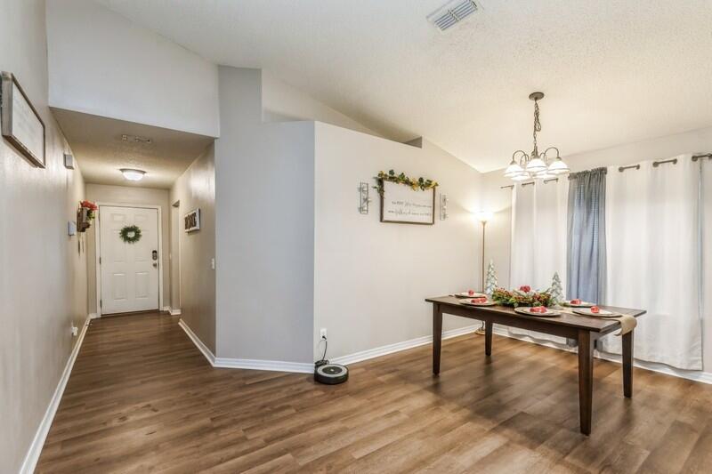 264 Limestone Circle Crestview, FL 32539 - Photo 4 of 38 a view of a room with wooden floor and white walls
