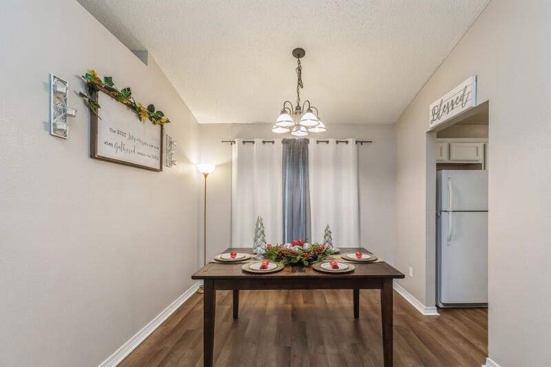 264 Limestone Circle Crestview, FL 32539 - Photo 5 of 38 a view of a room with furniture and chandelier