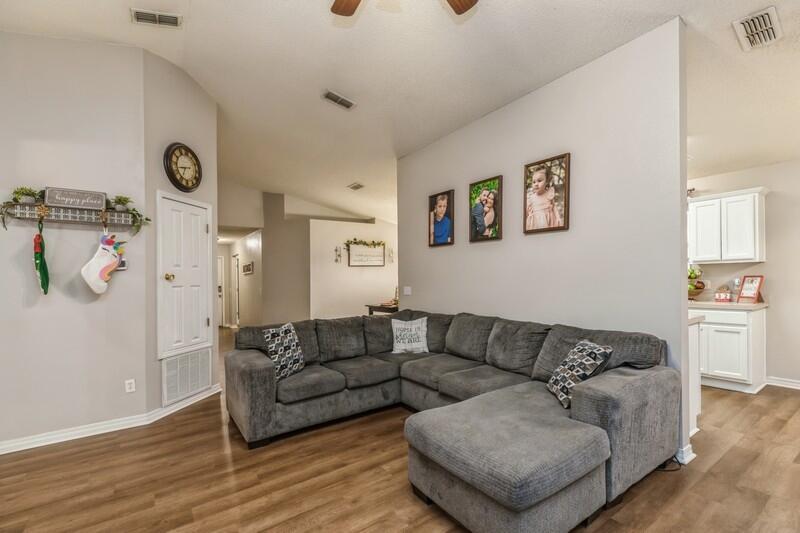 264 Limestone Circle Crestview, FL 32539 - Photo 10 of 38 a living room with furniture and a wooden floor