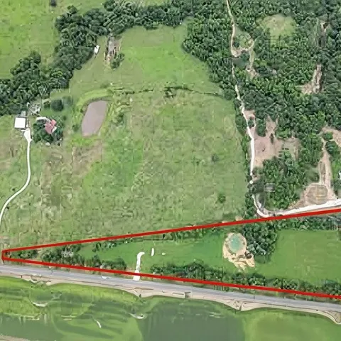 a view of a lake with a park