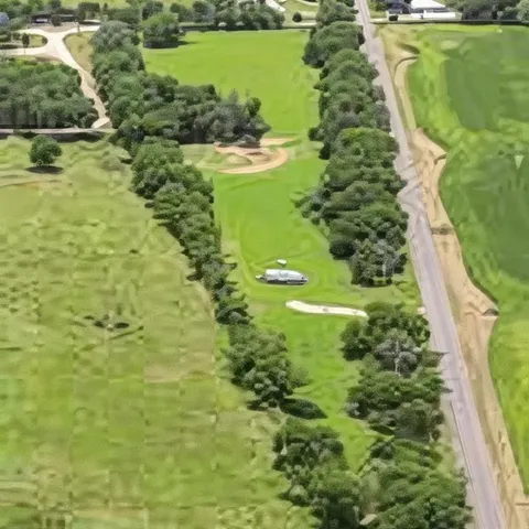 a view of a lake with a houses