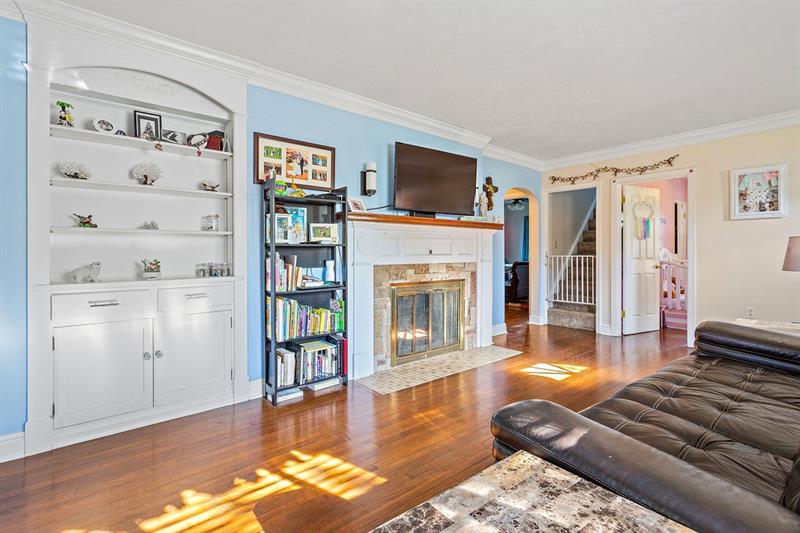 46 Herbst Road Coraopolis, PA 15108 - Photo 8 of 21 Charming Built-in Shelving and Log Fireplace add Character to this Lovely Living Room.