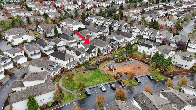 an aerial view of a city with lots of residential buildings