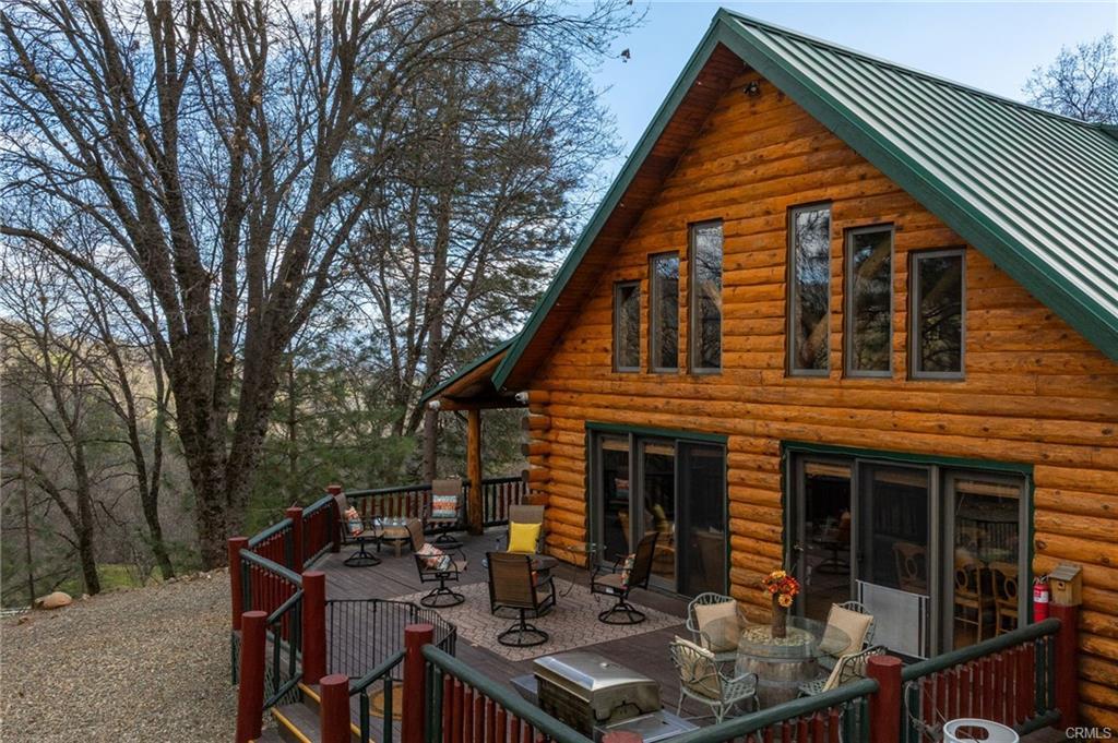 52815 Timberview Road North Fork, CA 93643 - Photo 32 of 75 a backyard of a house with seating space