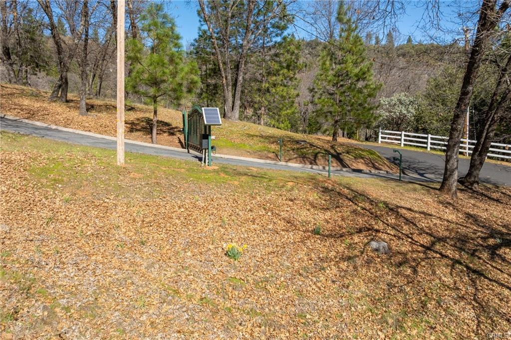 52815 Timberview Road North Fork, CA 93643 - Photo 57 of 75 a view of a yard with basketball ground