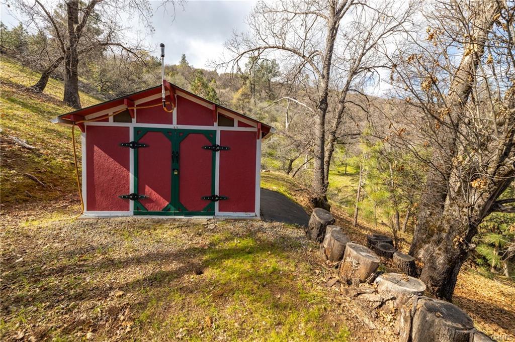 52815 Timberview Road North Fork, CA 93643 - Photo 70 of 75 a wooden building with trees in the background