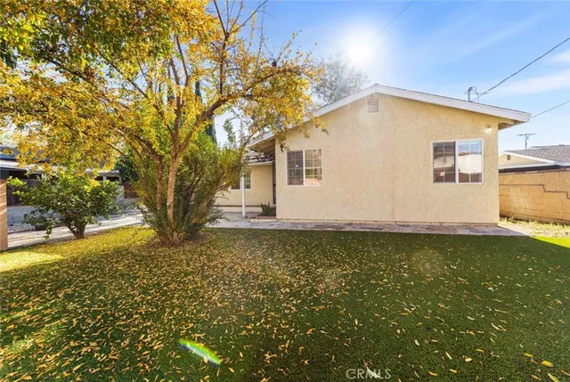 a house view with a garden space