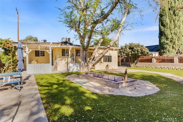 a view of a backyard with a garden