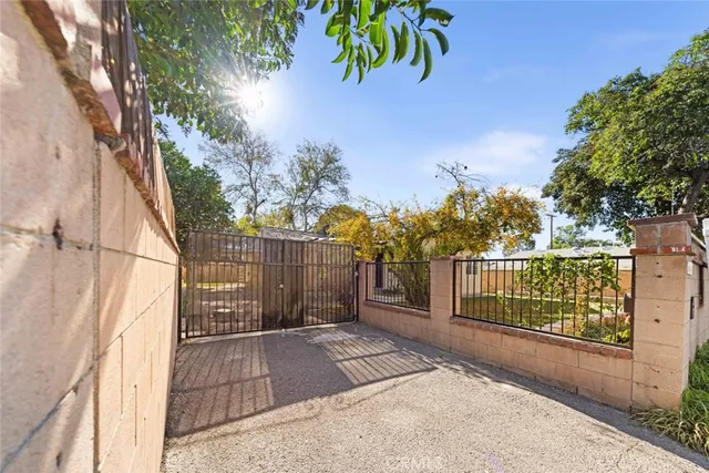 a view of a house with a tree