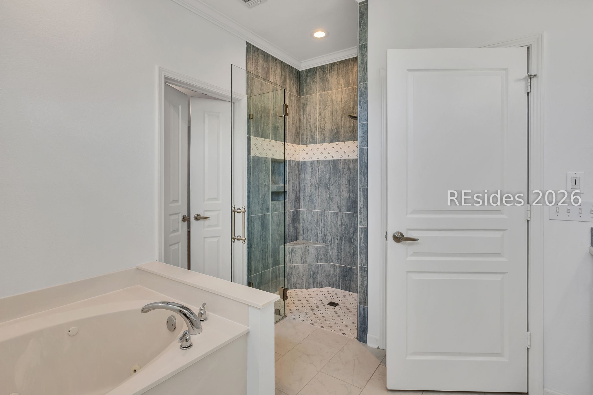 25 Columbus Circle Bluffton, SC 29909 - Photo 23 of 44 Primary Bathroom with Tile Walk In and Soaking Tub